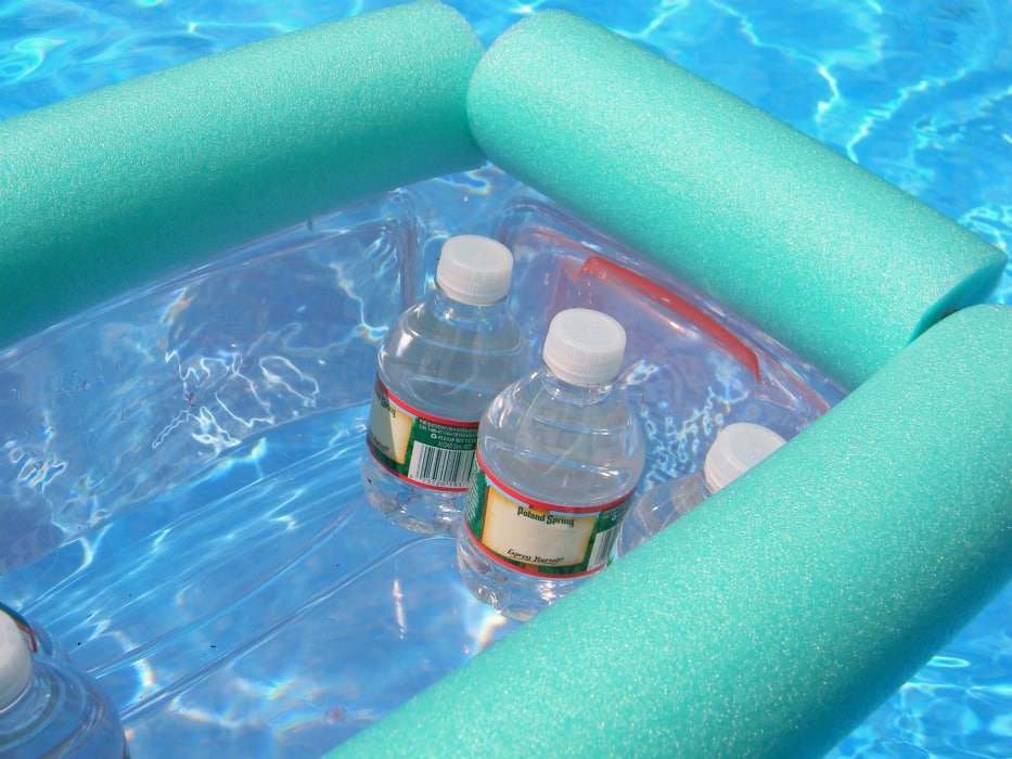 Make Summer even better with the easy pool noodle floating cooler DIY. Fill it with drinks and you can lounge poolside for the whole day!