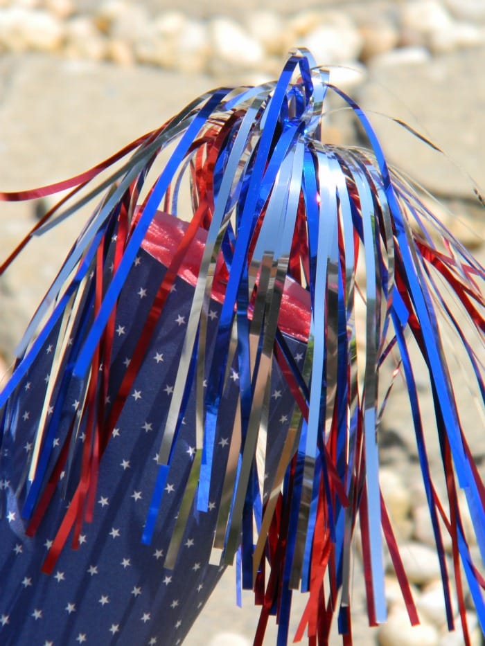 It's time to bust out your craft supplies! This easy pool noodle fireworks DIY is perfect for patriotic holidays! Great to make with kids, too.