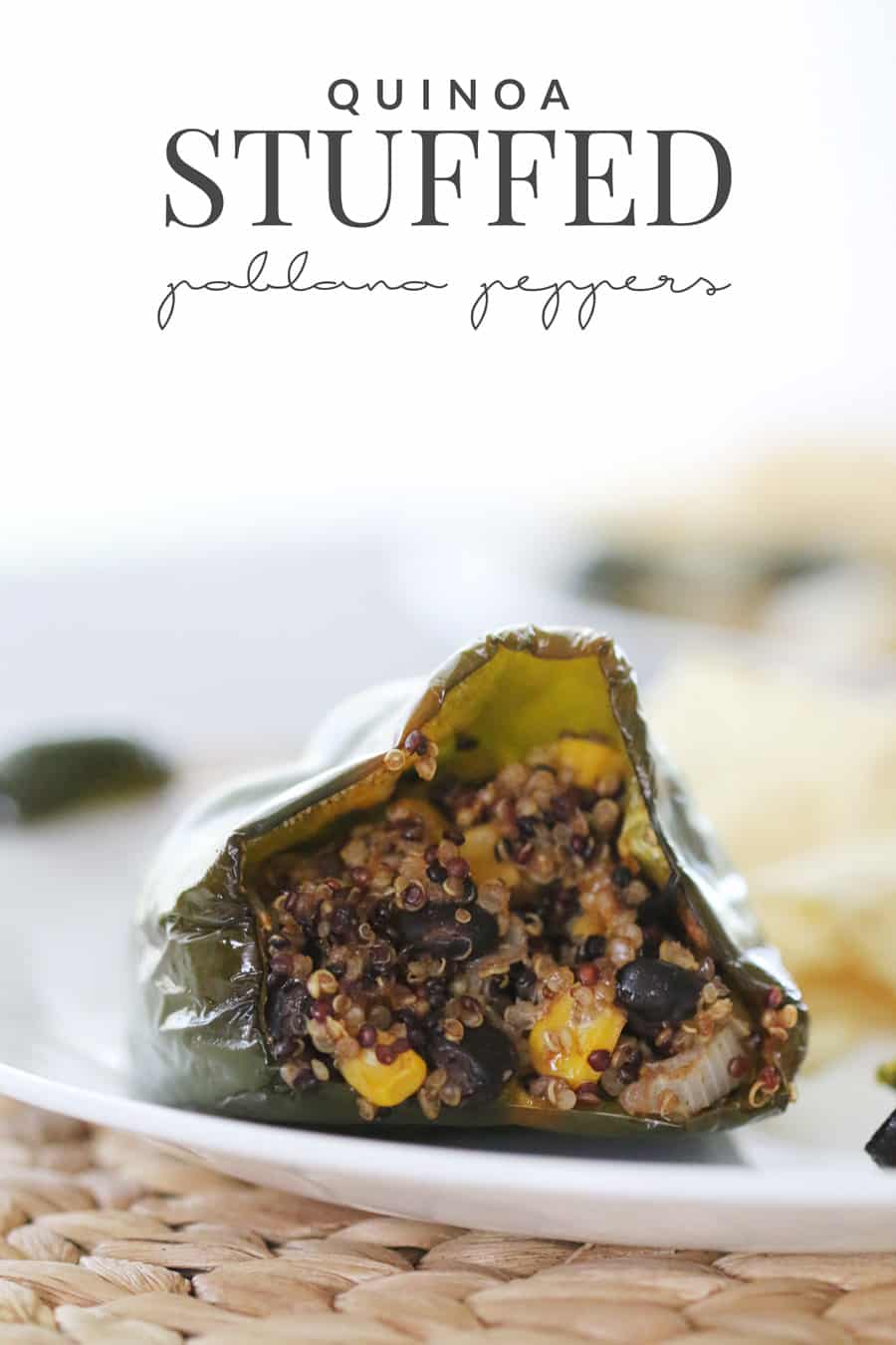 A delicious blend of black beans, corn, onions, and cheese mixed inside of quinoa stuffed peppers. It's hearty, scrumptious and not to spicy!