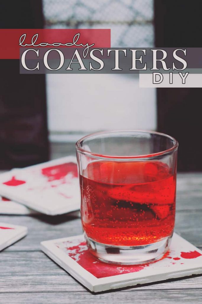 Serve your delicious drinks on these bloody coasters this Halloween! This blood-splattered coaster DIY with ceramic tiles is super easy and inexpensive!