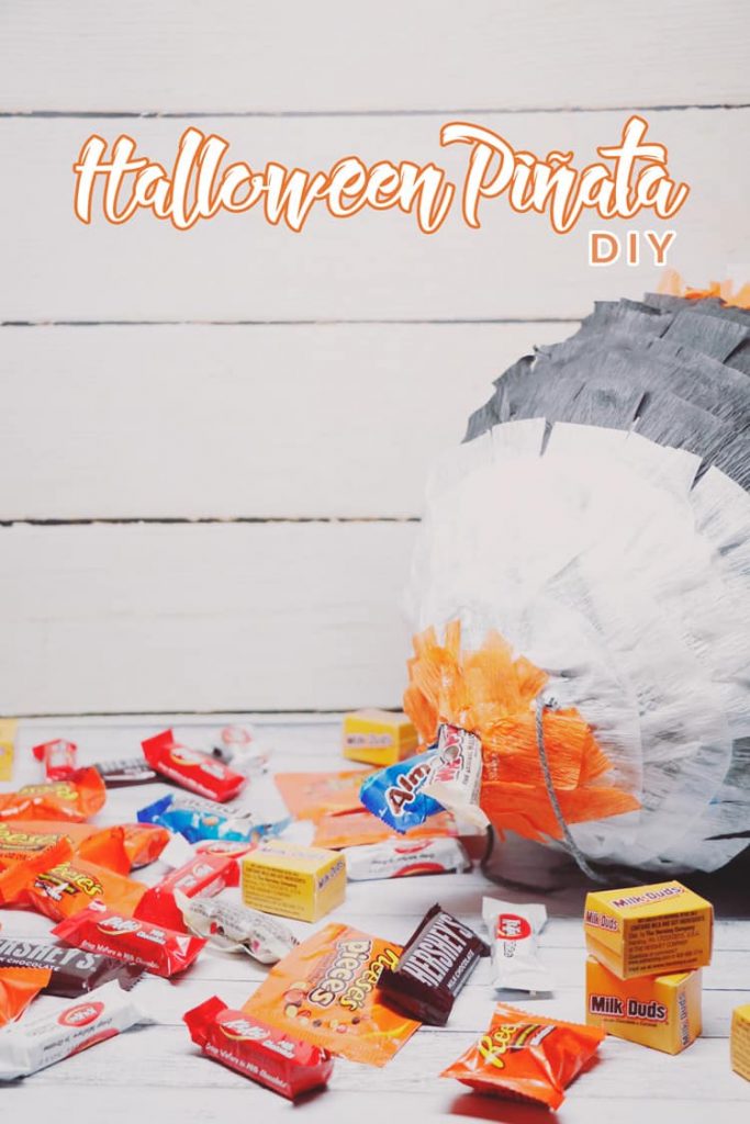 Get ready for your next Halloween party with this easy to make Halloween Piñata DIY! Fill it with your favorite candy and have fun with the whole family!