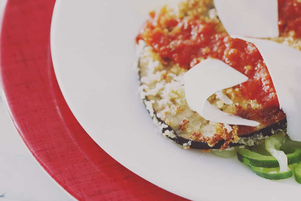 A simple and healthy twist on Eggplant Parmesan with zucchini noodles in place of regular noodles. Easy to make and delicious to eat!