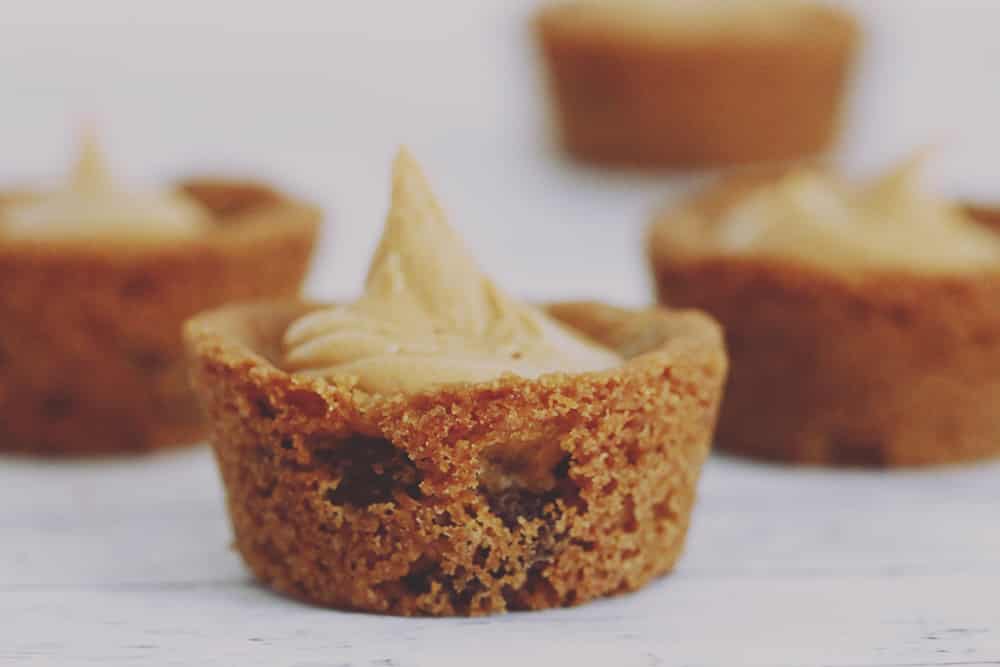 What could be better than peanut butter chocolate chip pies? Mini peanut butter chocolate chip pies! These little morsels are SUPER easy + delicious, too!