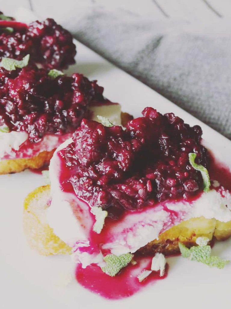 Need a new way to enjoy your Summer berries? This Blackberry and Mozzarella Grilled Crostini recipe is the perfect savory dish!