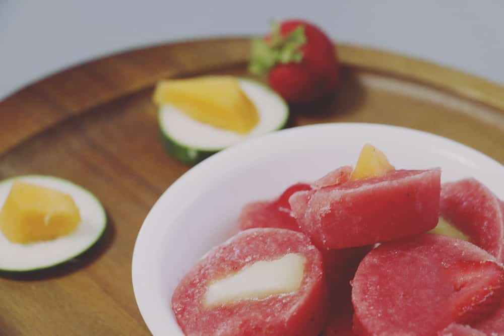 Help your pup cool down this Summer with these easy to make Strawberry Cucumber Melon Dog Treats! Your pup is sure to love this frozen treat!