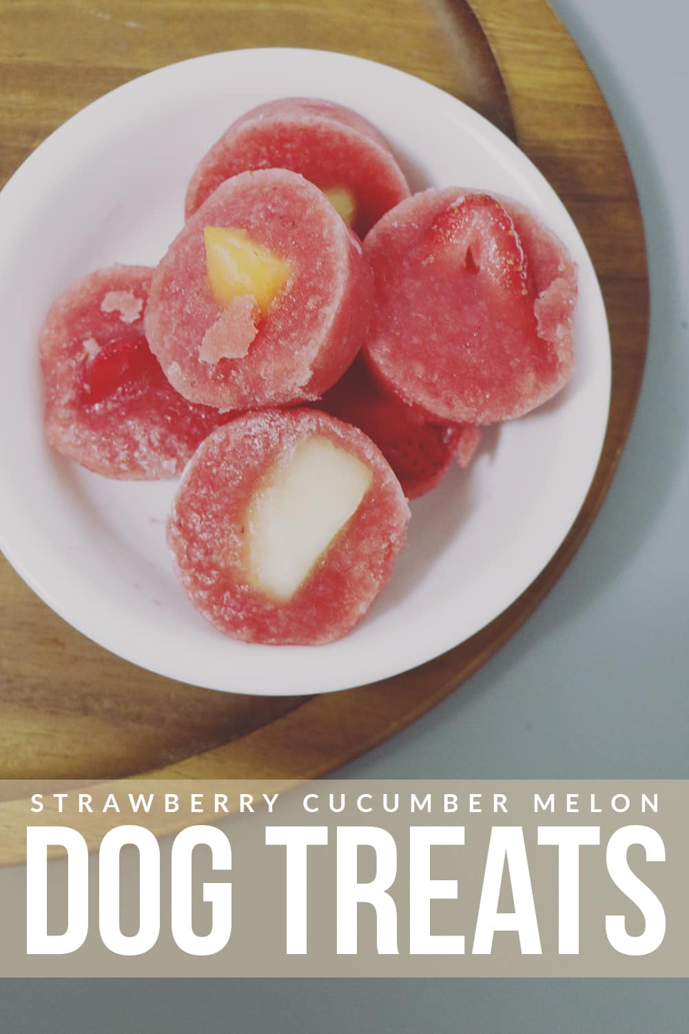 Help your pup cool down this Summer with these easy to make Strawberry Cucumber Melon Dog Treats! Your pup is sure to love this frozen treat!