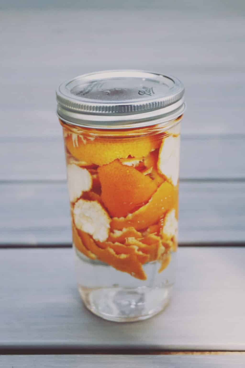 This two ingredient Citrus Infused Vinegar Cleaner is the perfect addition to your cleaning arsenal! It's eco-friendly, inexpensive and easy to make!