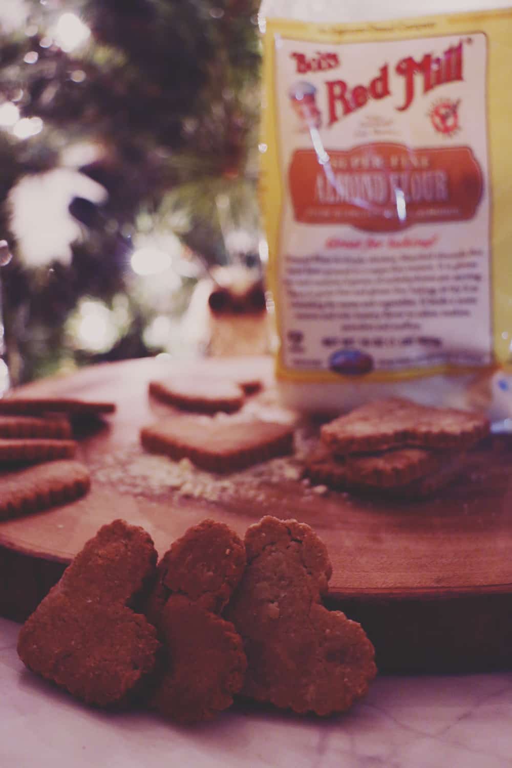 Need a gift for your furry friend? Make these deliciously easy Peanut Butter Almond Dog Biscuits! You'll never need store bought treats again!