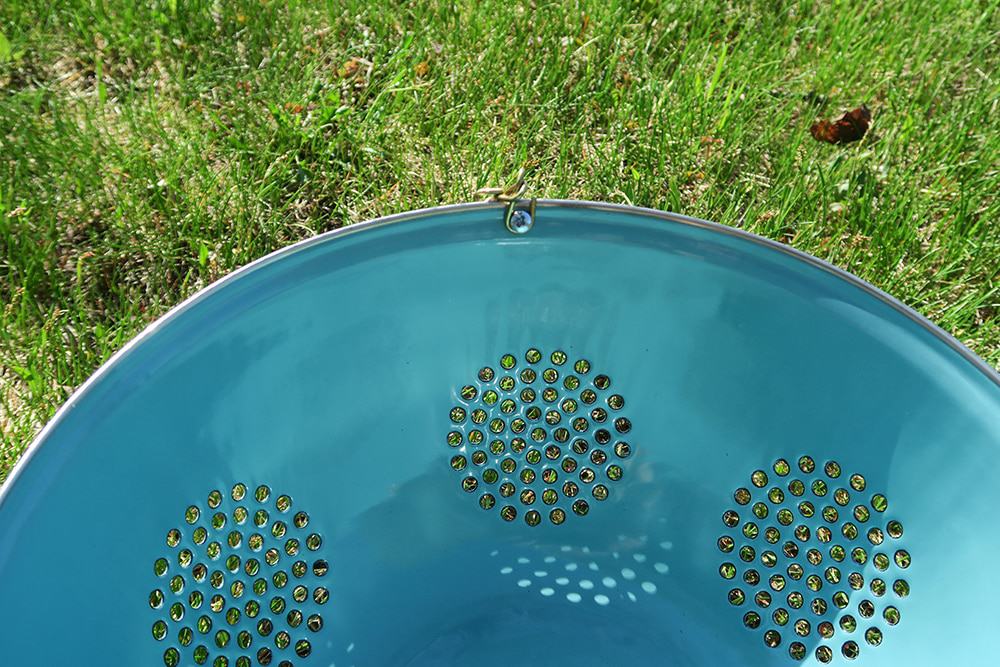 Container gardening just got more fun! With just a few supplies, you can turn a simple kitchen utensil into a unique DIY Hanging Colander Planter.