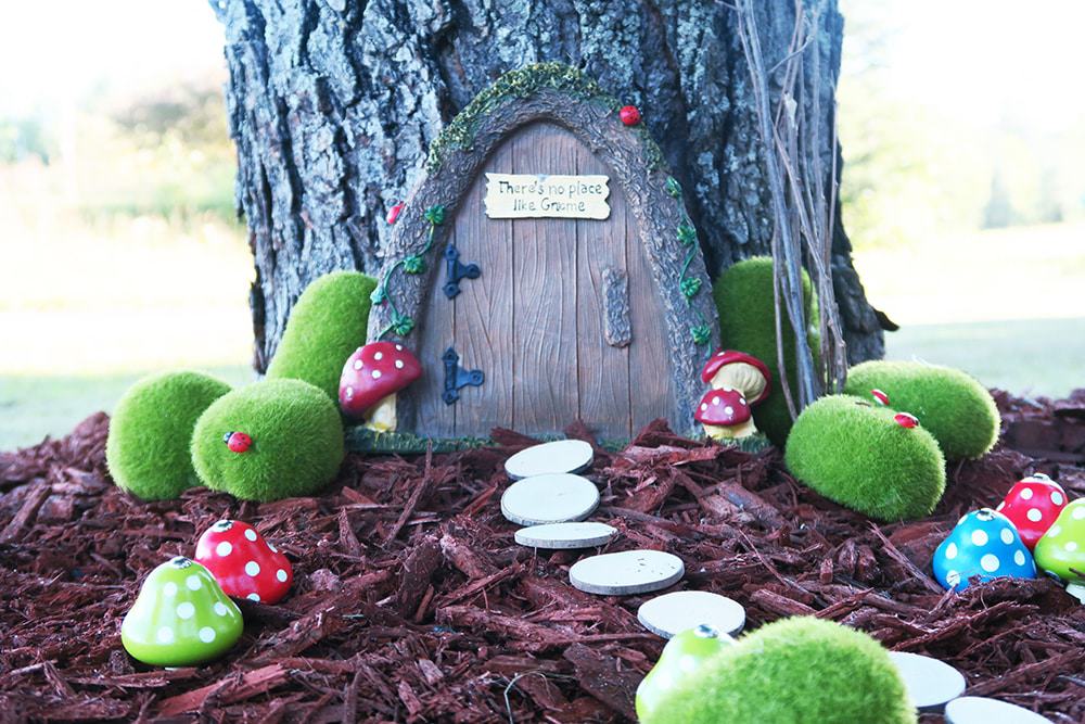 Want to add some whimsy to your yard? This simple DIY fairy garden is the answer! You'll turn your tree base into a magical scene in no time.