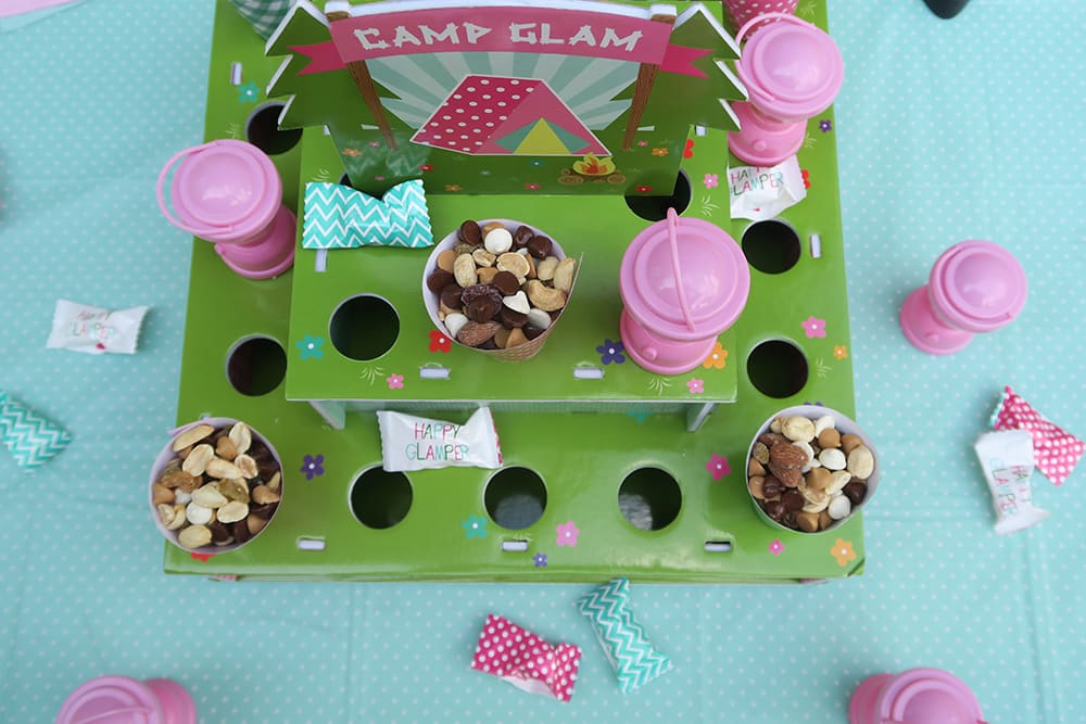 A camping birthday party is perfect for girls, young and old! This is one of the easiest cheap birthday party ideas that's fun for the whole family. 