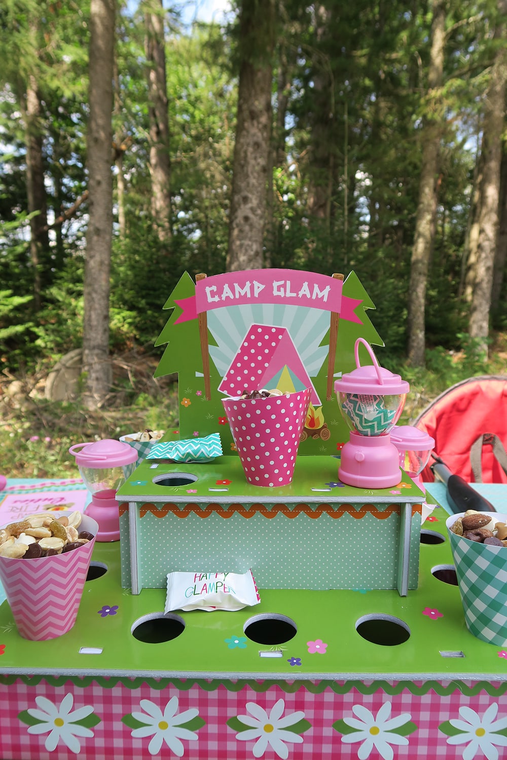 A camping birthday party is perfect for girls, young and old! This is one of the easiest cheap birthday party ideas that's fun for the whole family. 