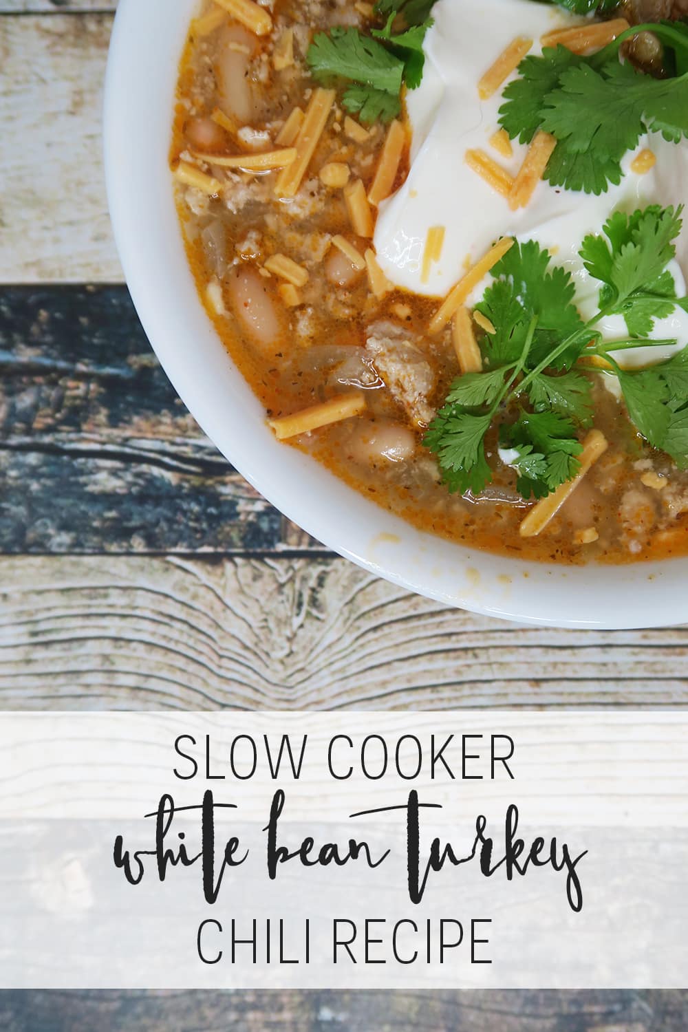 Need a hearty and healthy dish for the colder months? This Slow Cooker White Bean Turkey Chili recipe is super easy and ready in less than three hours!