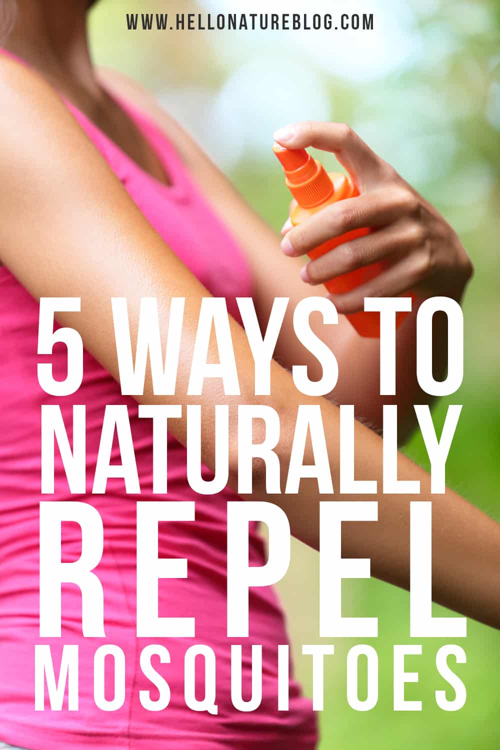 woman spraying insect repellent