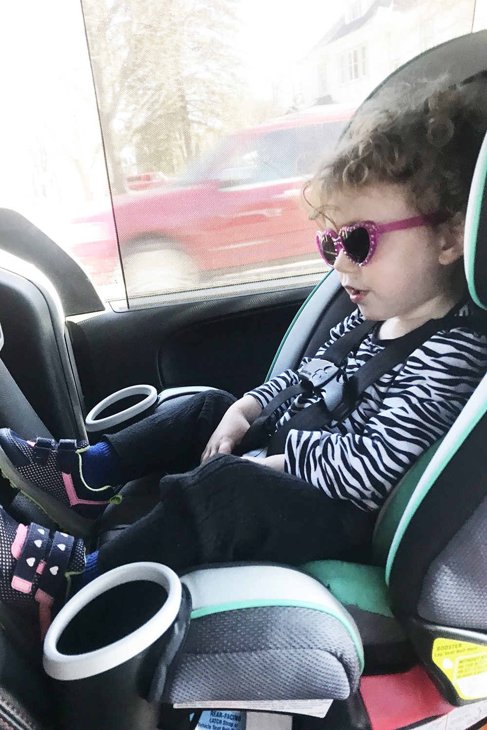 baby girl in car seat