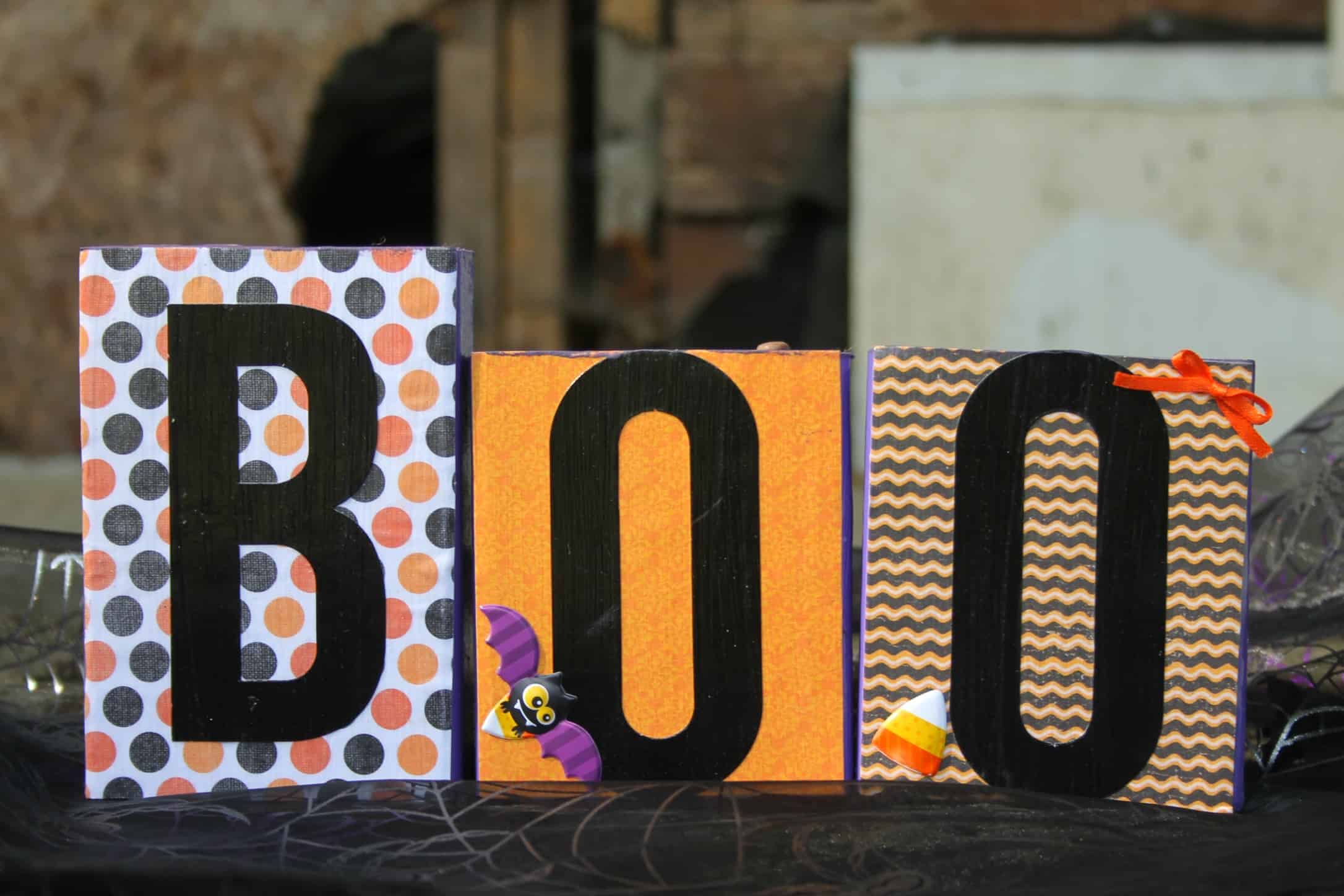 Need some indoor Halloween decorating ideas? Make this Halloween Boo Block DIY! You'll have decor that can be used year after year with this simple and fun project.