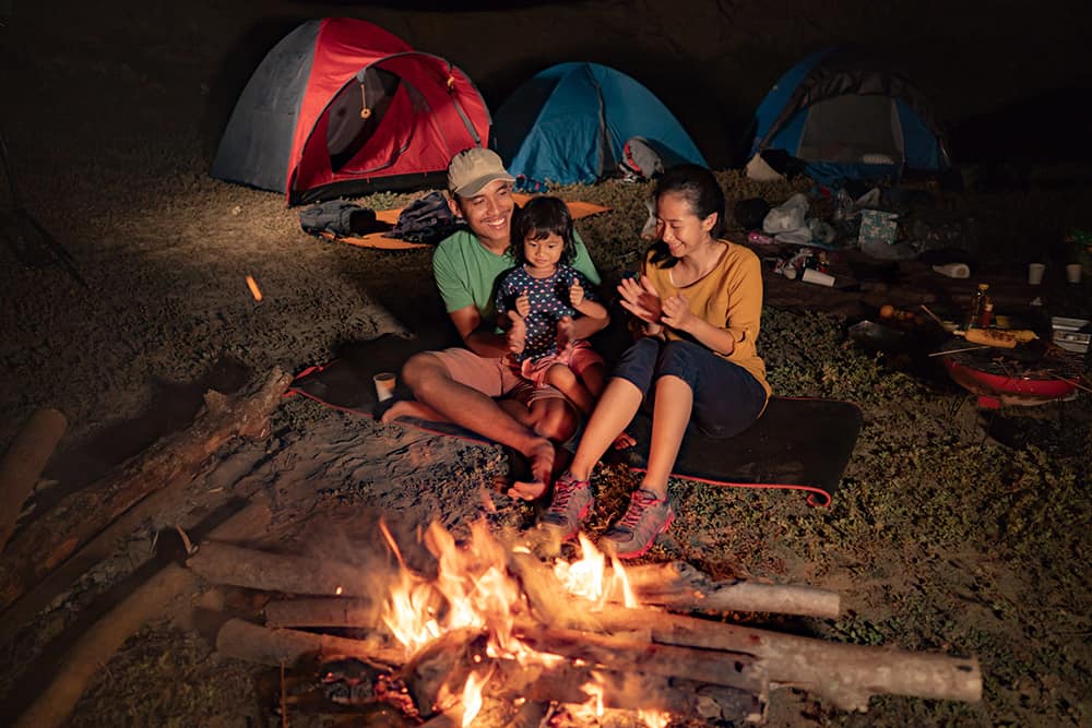 family camping at night