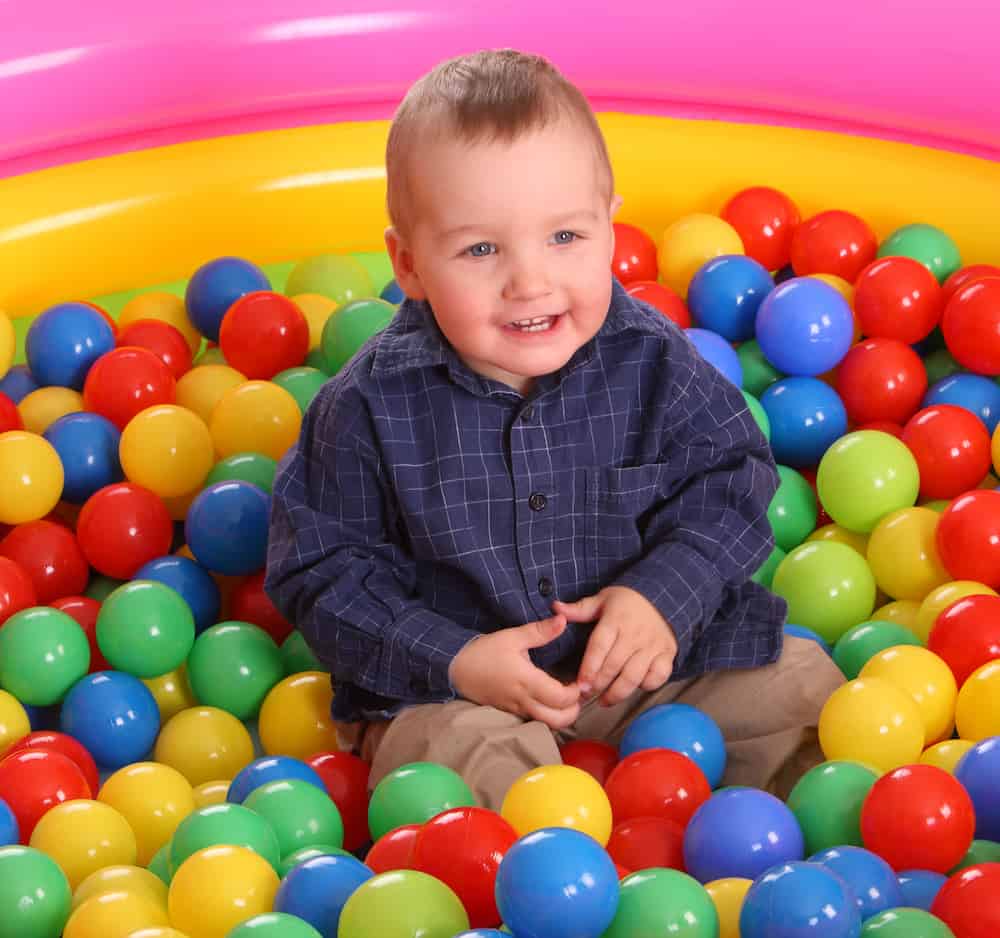 boy in ball pit