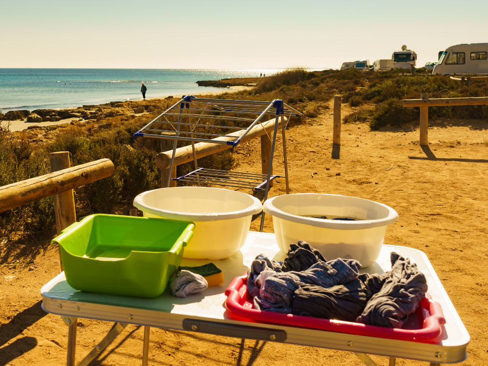 Hand washing clothes while camping