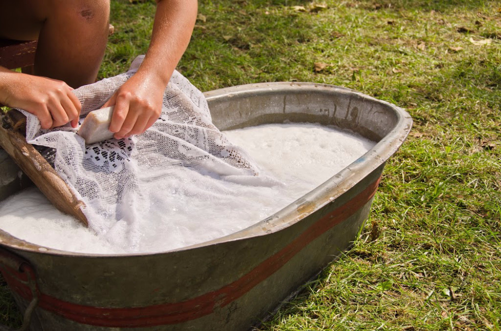 Hand Washing Laundry in a Bucket