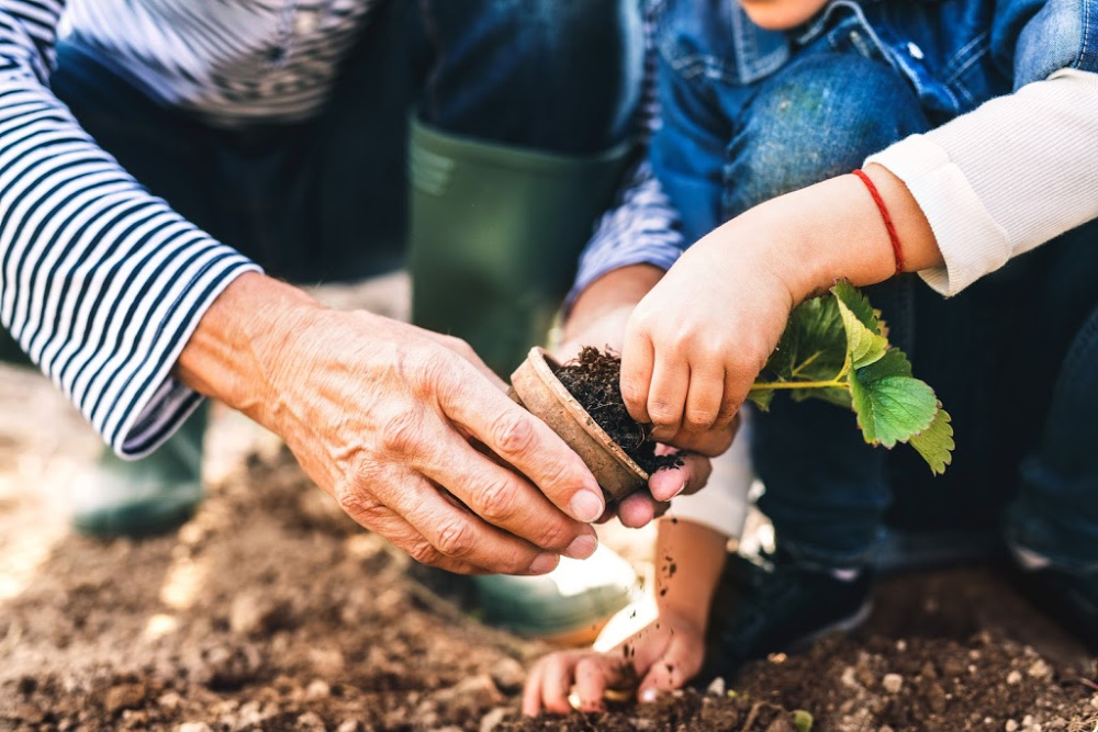 family planting together